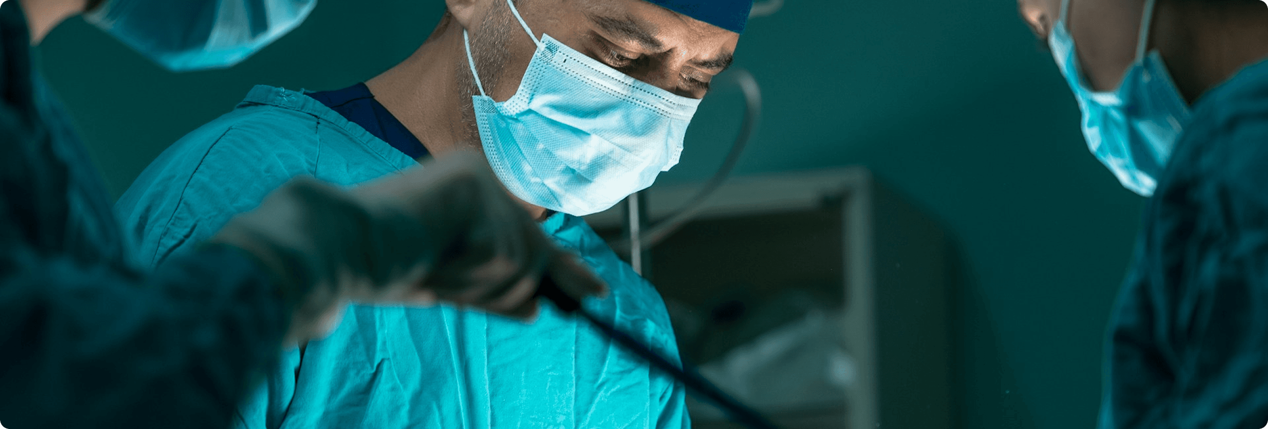 Close up on operating surgeon